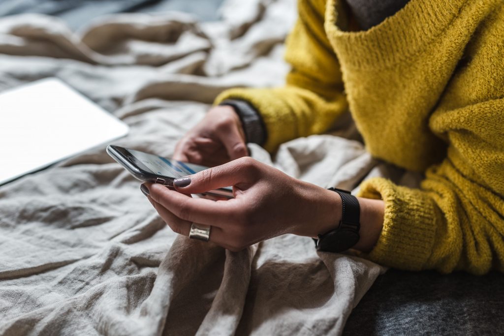 mobile phone on bed